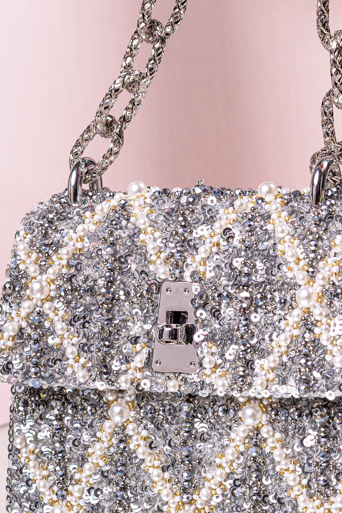 Divya Gurwara With The Erica Smokey Quartz Handheld Mini Bag