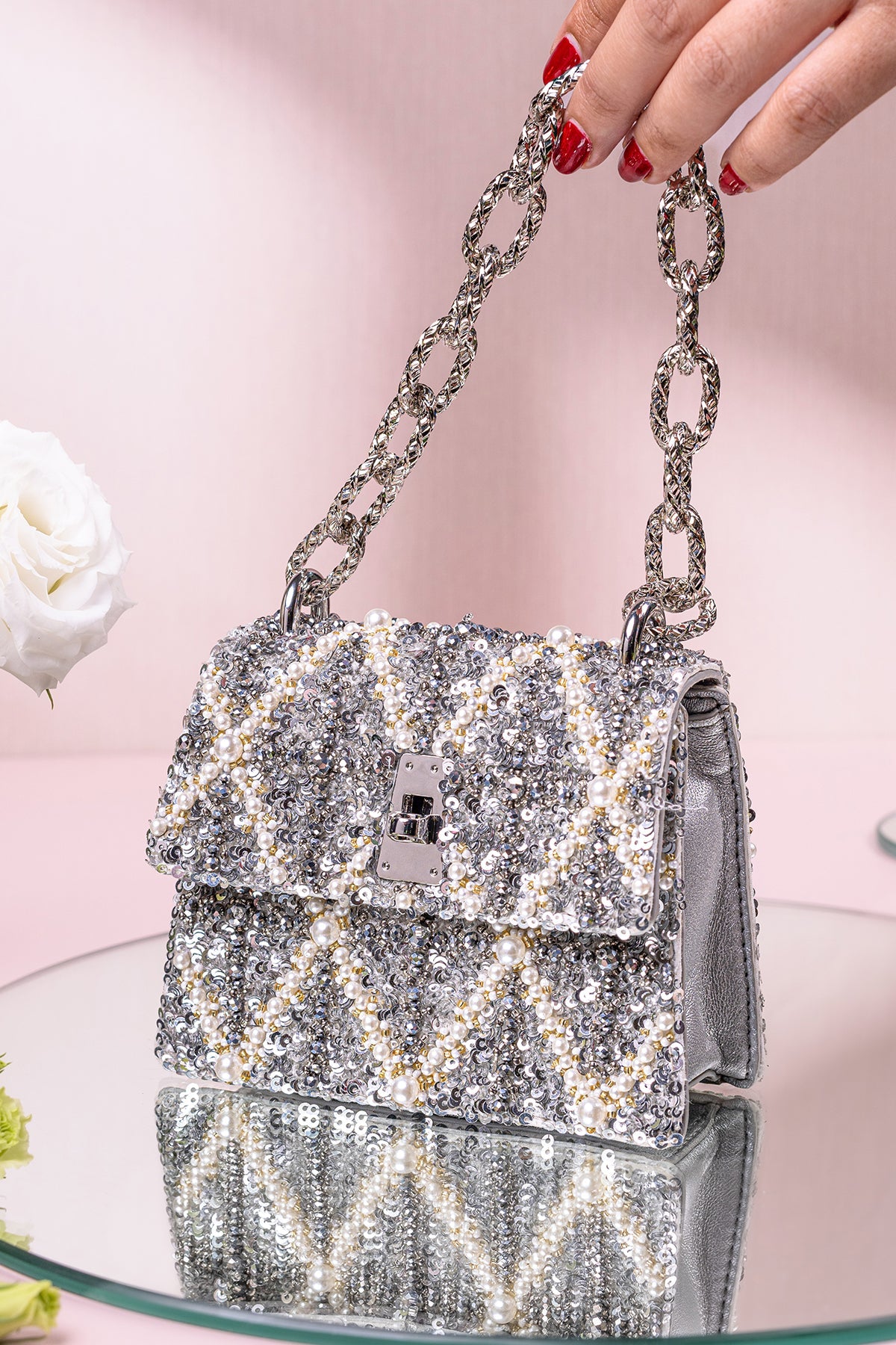 Divya Gurwara With The Erica Smokey Quartz Handheld Mini Bag