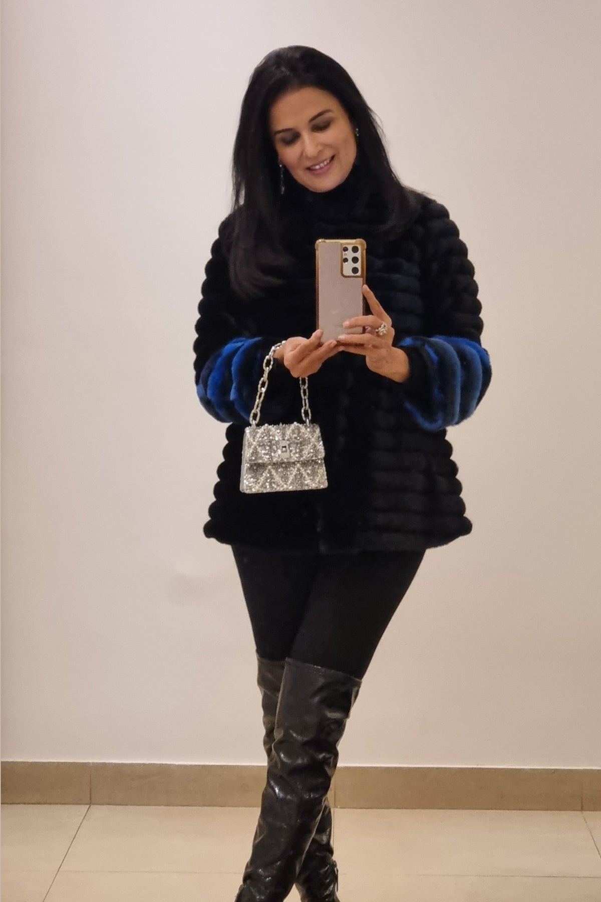 Divya Gurwara With The Erica Smokey Quartz Handheld Mini Bag
