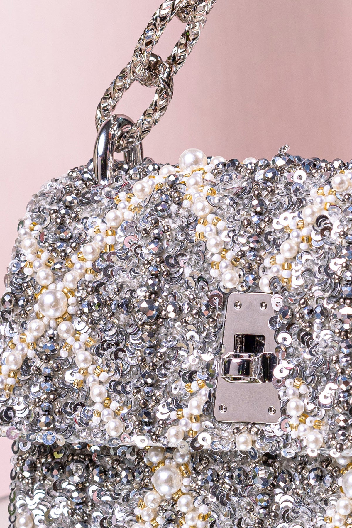 Divya Gurwara With The Erica Smokey Quartz Handheld Mini Bag
