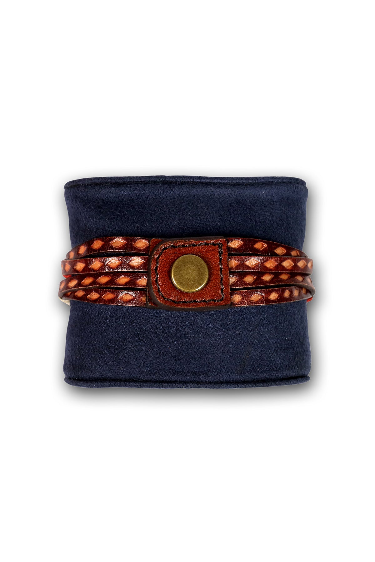 Hand tooled bracelet with knot detail