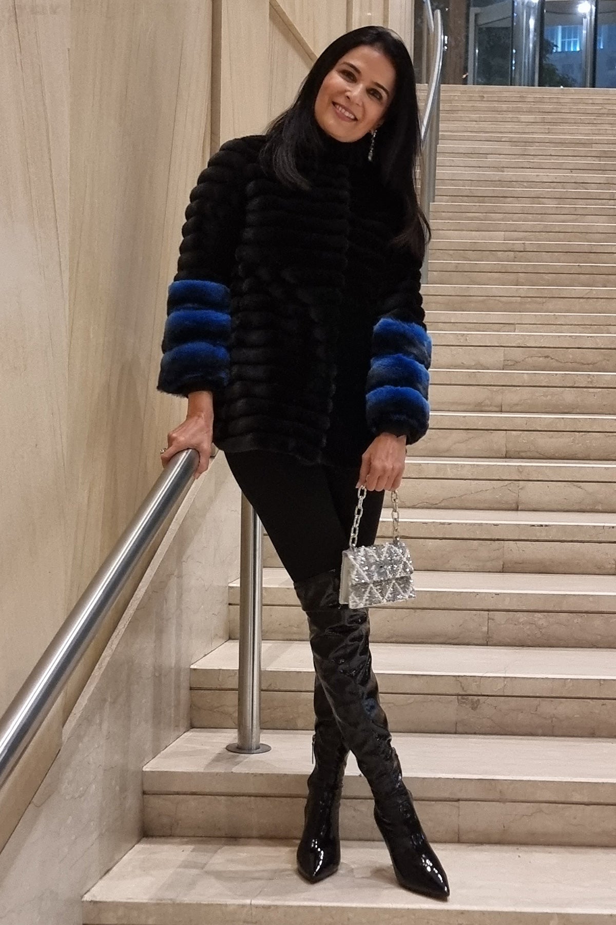Divya Gurwara with the Erica Smoky Quartz Handheld Bag