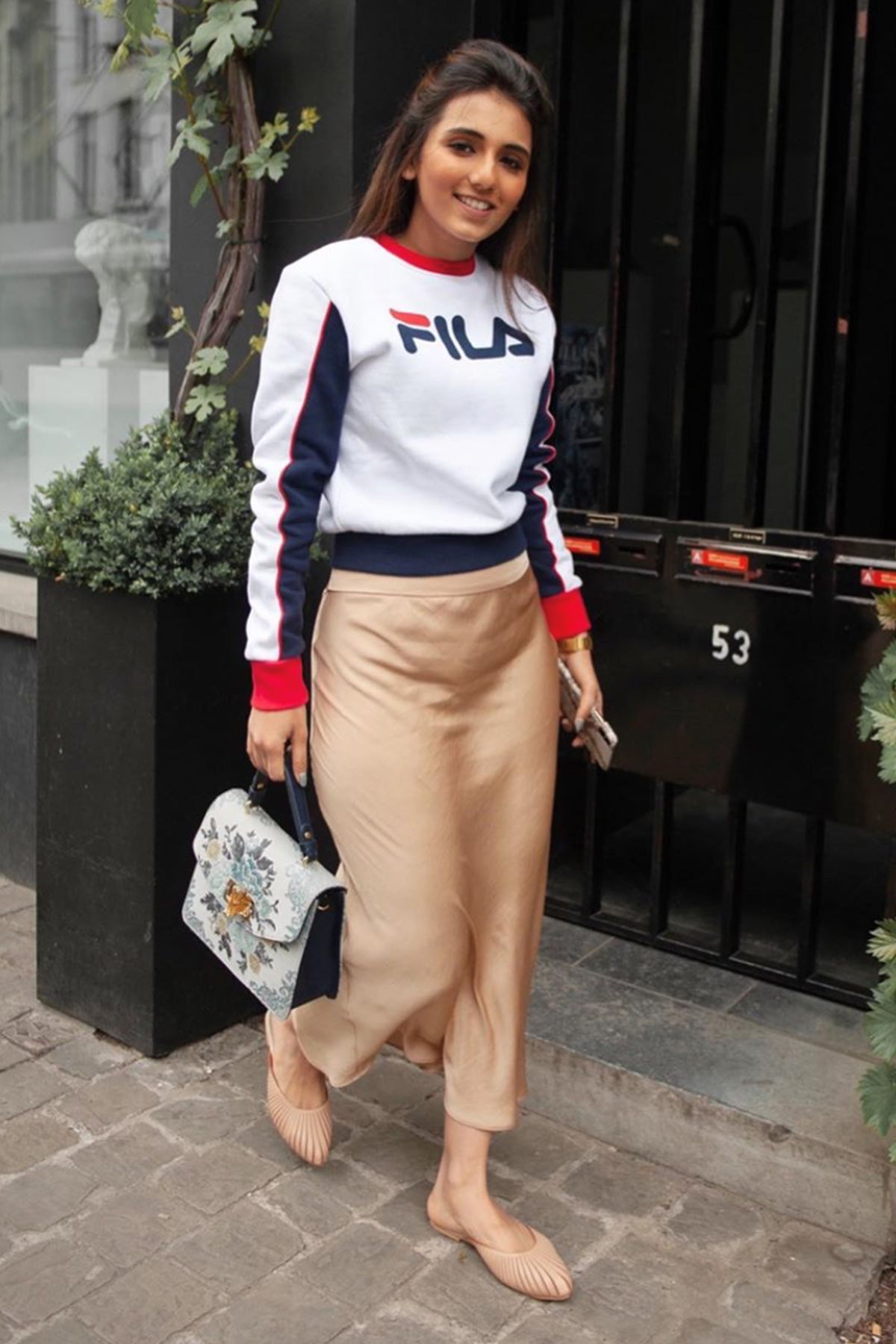 Masoom Minawala with the Hydrangea Pigeon Blue Bag