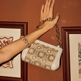 Adia Gold embellished potli bag