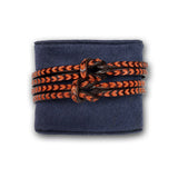 Hand tooled bracelet with knot detail